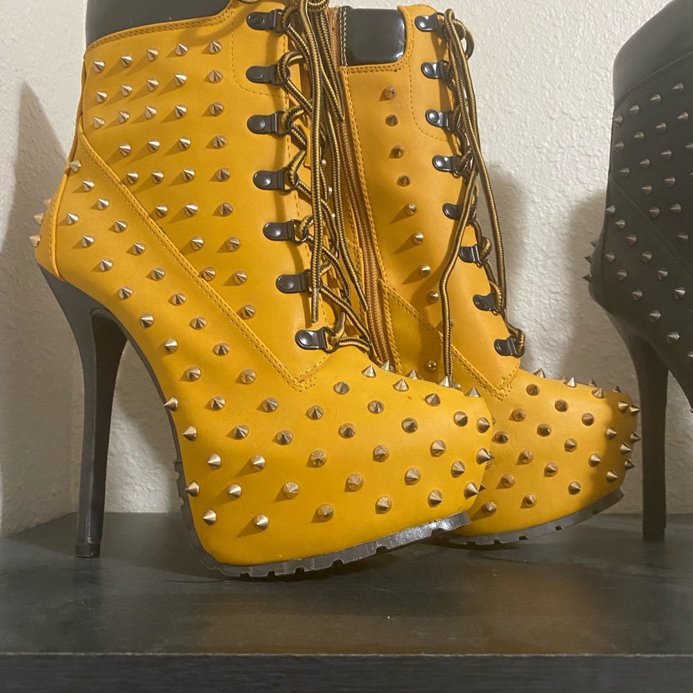 Women’s heel boots with spikes.